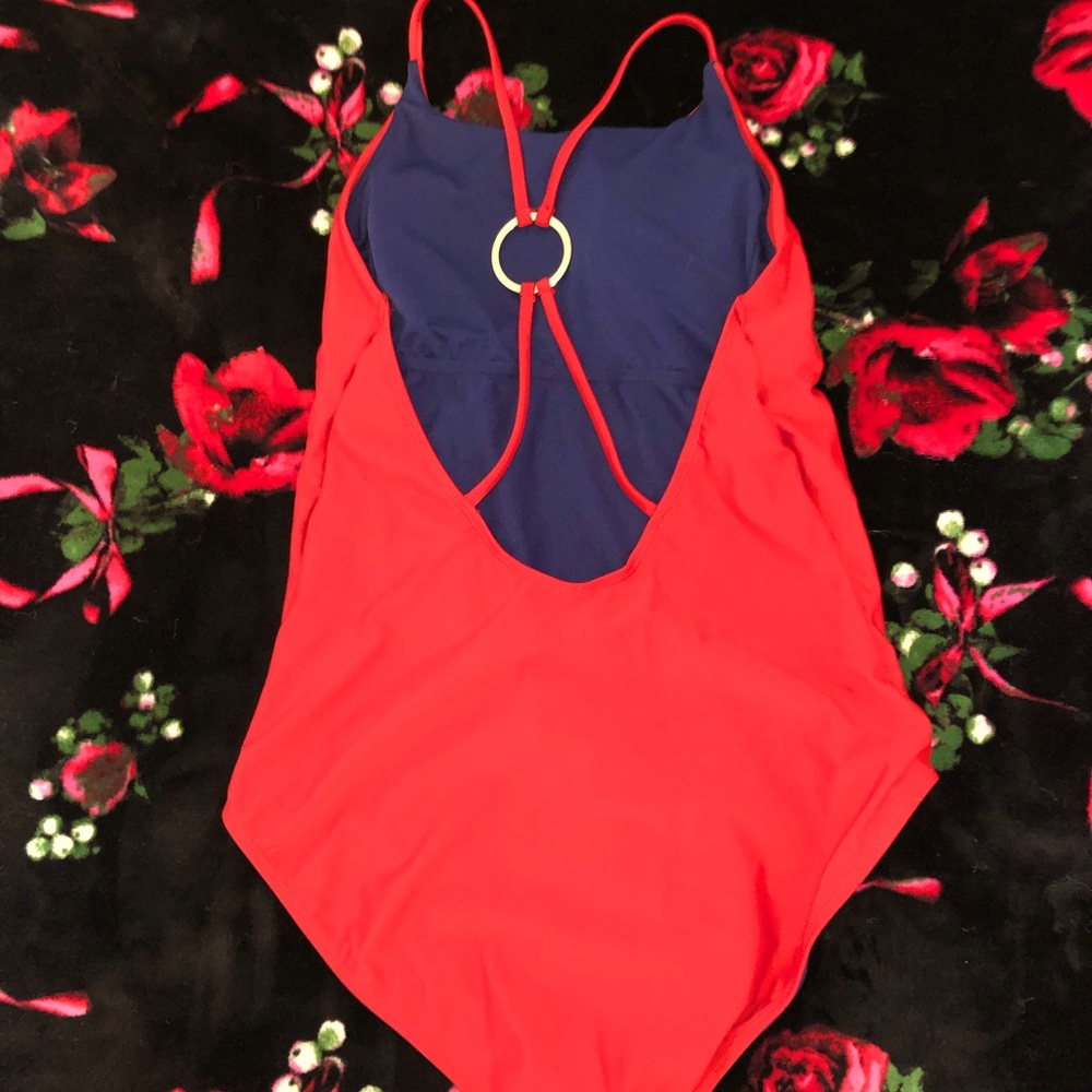 I am selling this Polo red and navy blue one piece